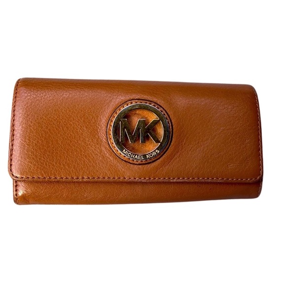 Michael Kors Handbags - Michael Kors brown leather wallet.